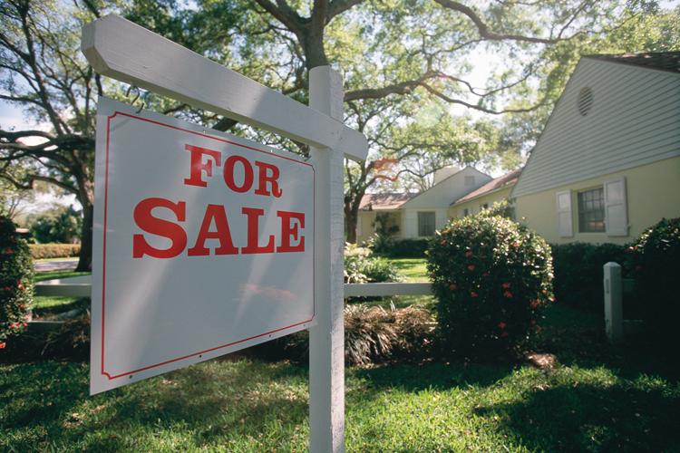 For sale sign in front of a Georgia home
